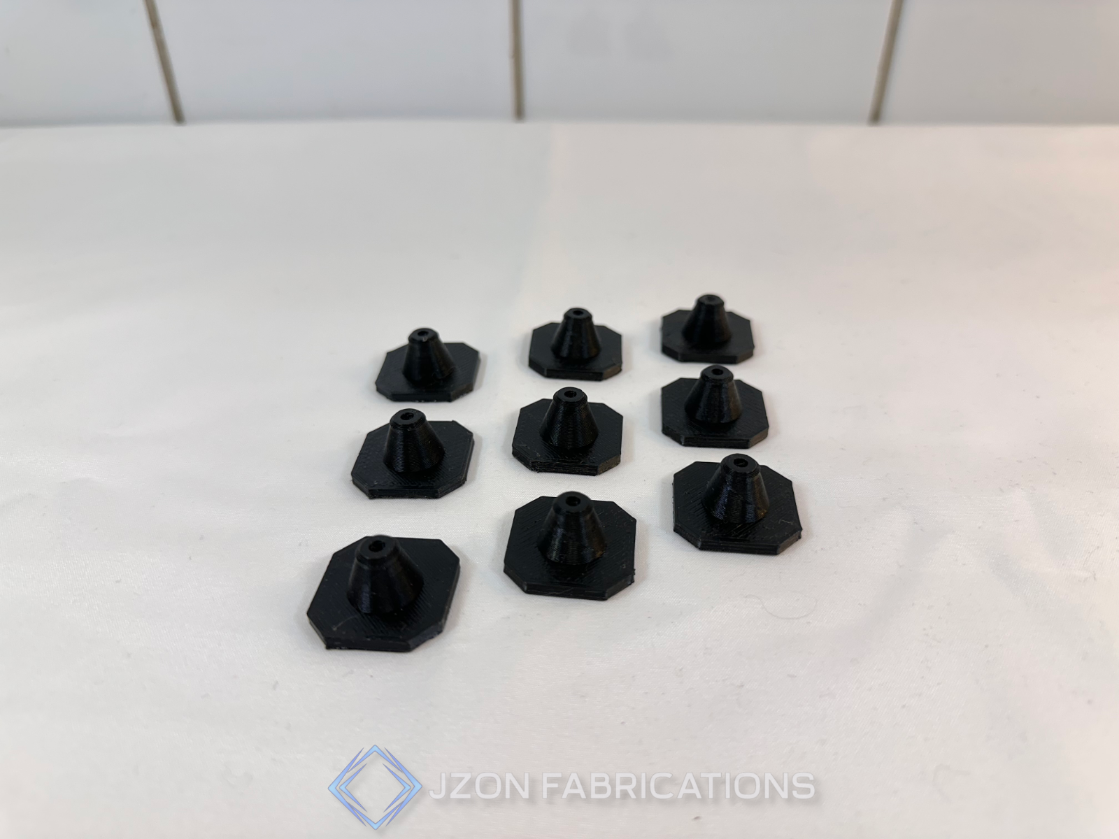 black-motherboard-support-feet-fits-multiple-motherboard-form-factors