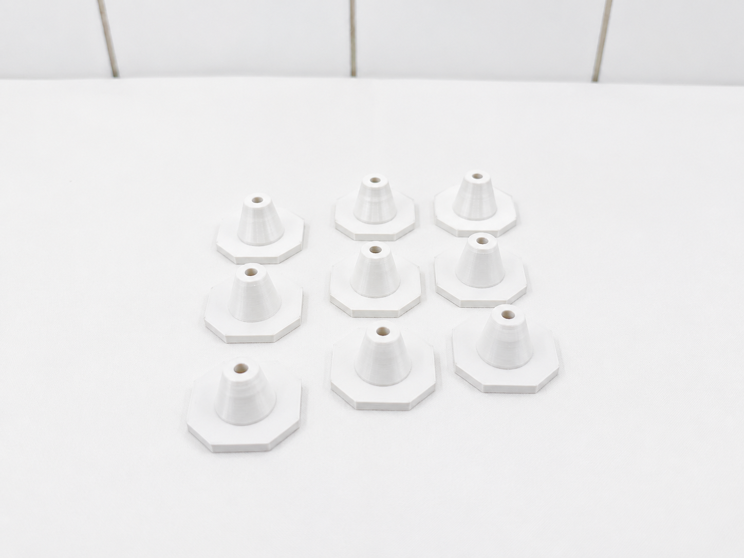 white-motherboard-support-feet-fits-multiple-motherboard-form-factors